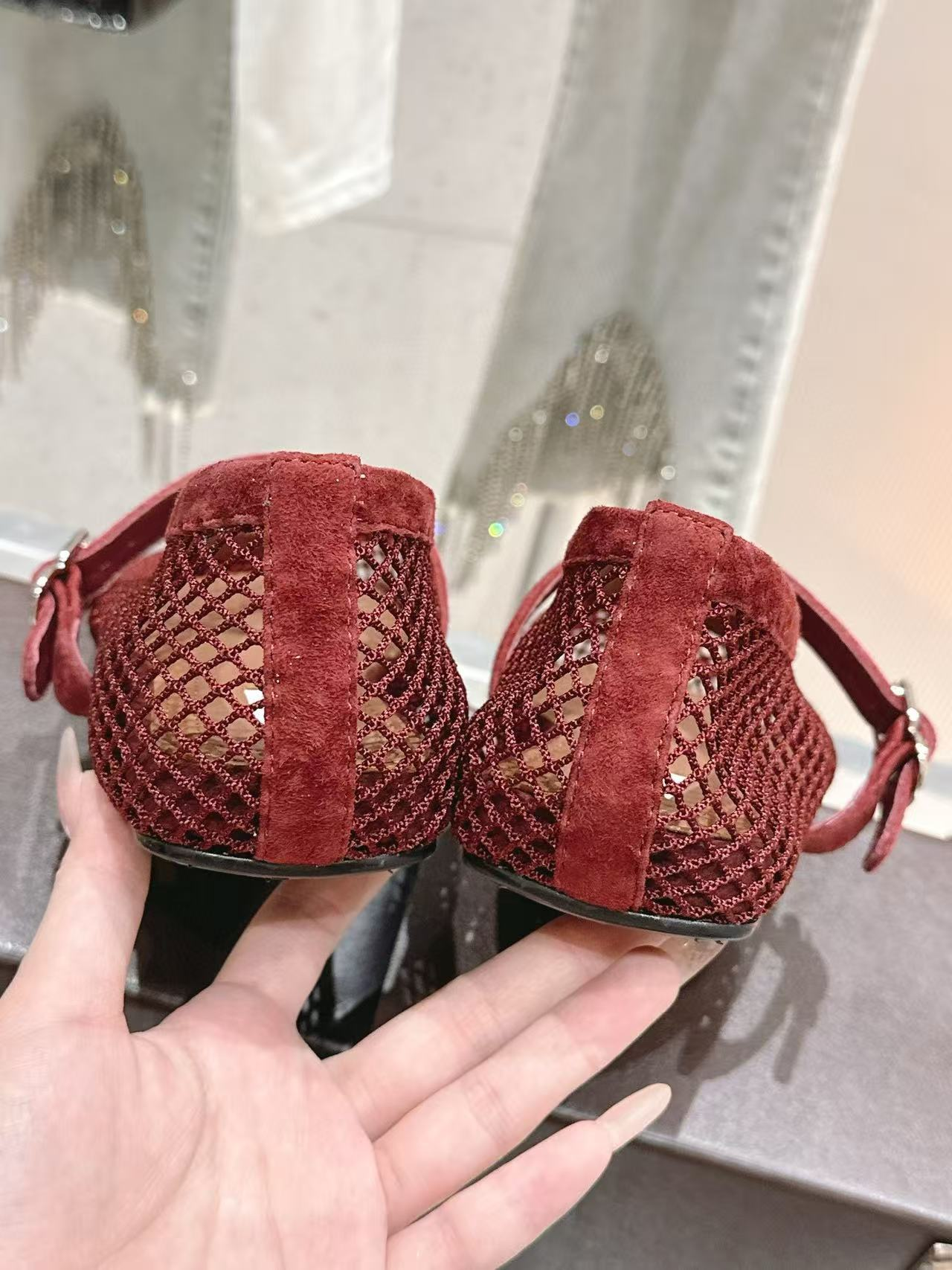 UA ALAÏA BALLET FLATS IN FISHNET