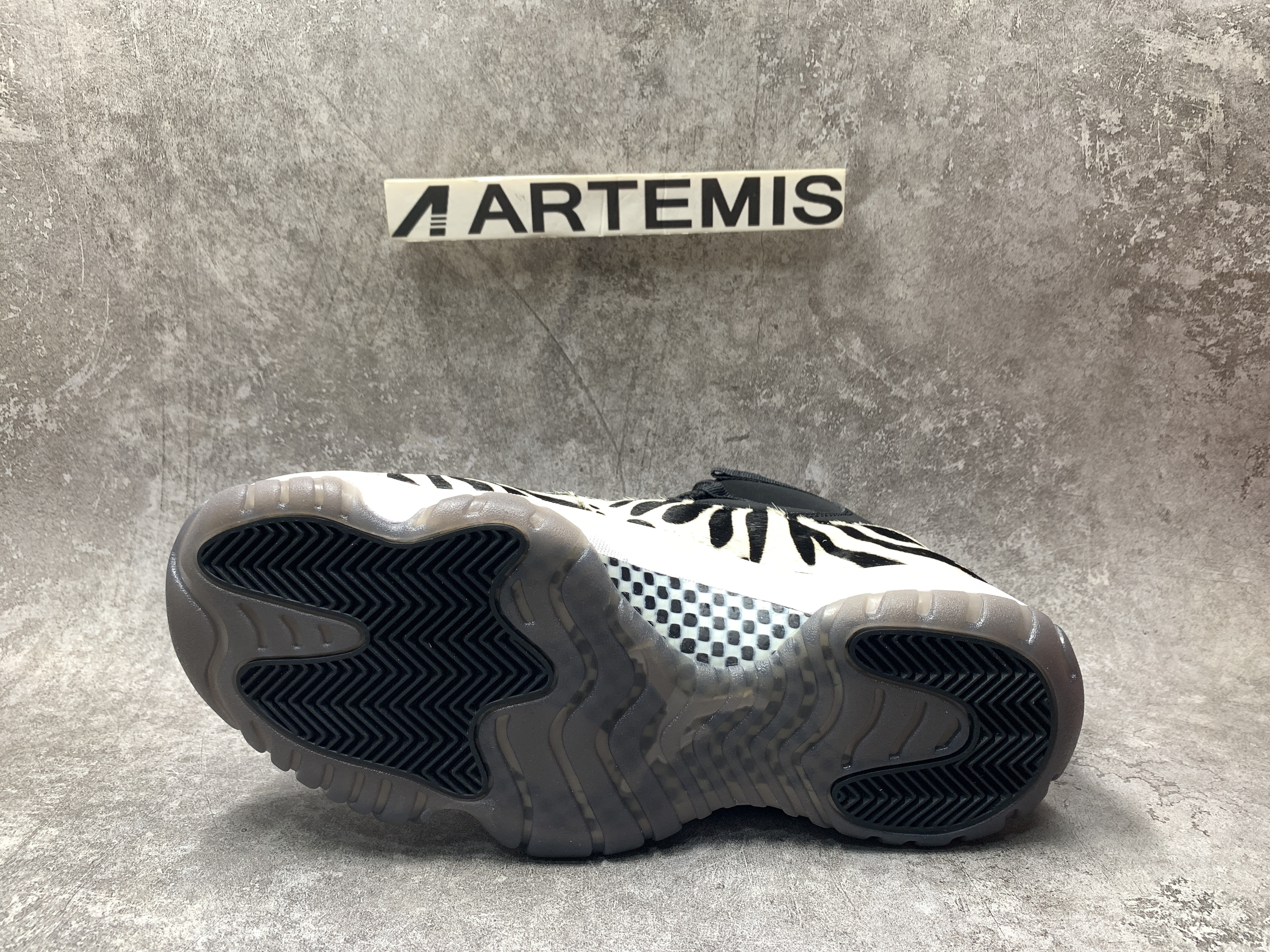 Air Jordan 11 Animal Instinct